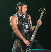 Robert Trujillo playing Aria SB bass on stage