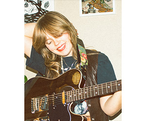 Maddisun with Aria Acoustic Guitar