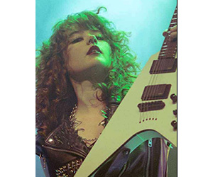 Rhea Thompson with Aria Pro II Guitar